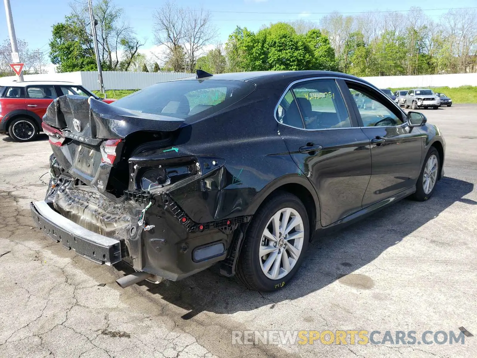 4 Photograph of a damaged car 4T1C11BK4MU024987 TOYOTA CAMRY 2021