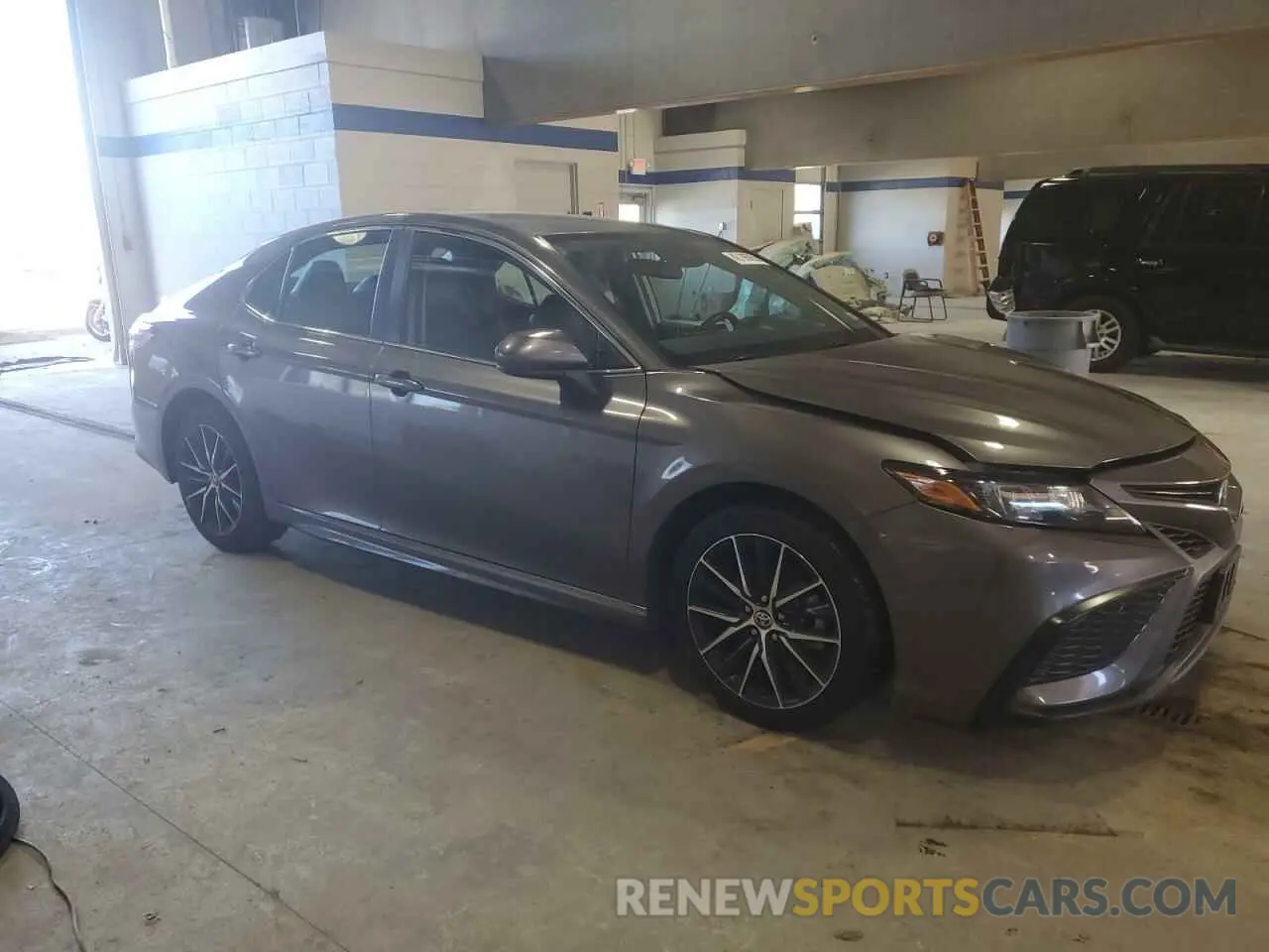 4 Photograph of a damaged car 4T1G11AK0MU466880 TOYOTA CAMRY 2021