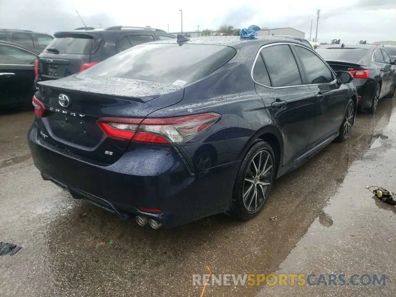4 Photograph of a damaged car 4T1G11AK0MU593130 TOYOTA CAMRY 2021
