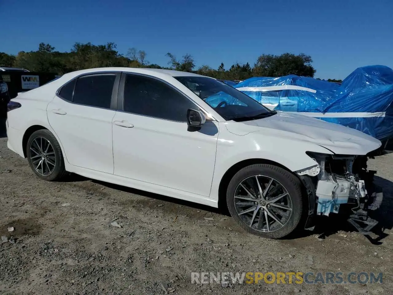 4 Photograph of a damaged car 4T1G11AK3MU589413 TOYOTA CAMRY 2021