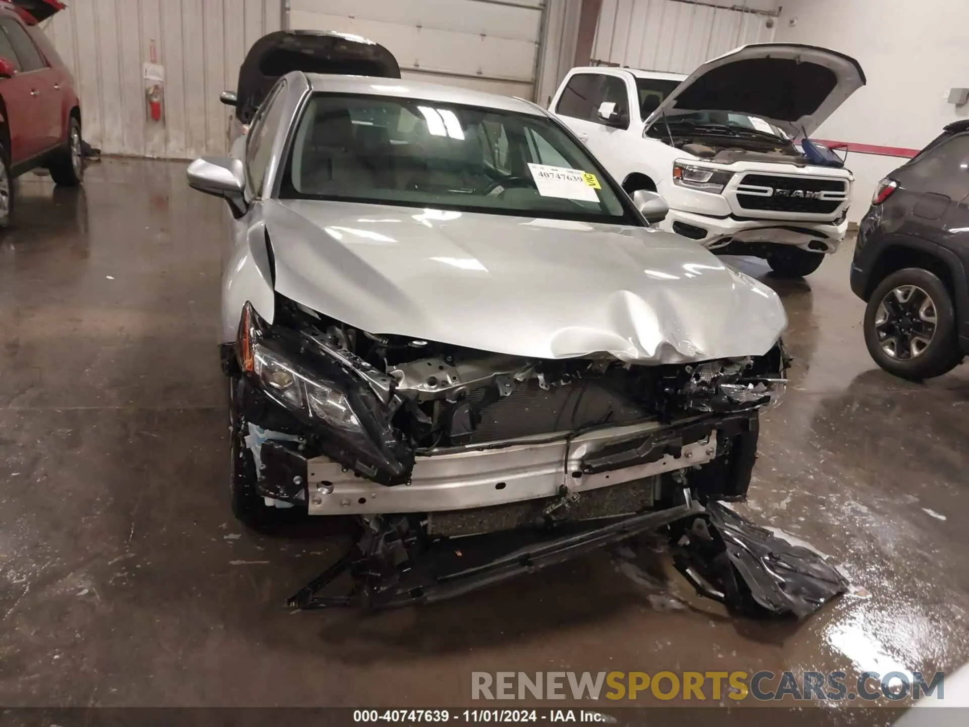12 Photograph of a damaged car 4T1G11AK3MU593509 TOYOTA CAMRY 2021