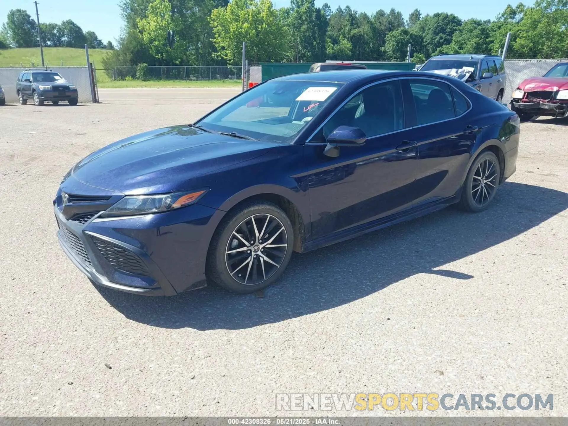 2 Photograph of a damaged car 4T1G11AK4MU412434 TOYOTA CAMRY 2021