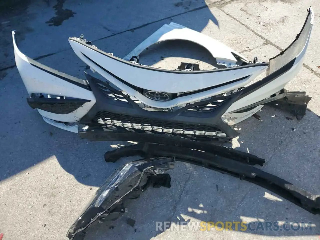 12 Photograph of a damaged car 4T1G11AK6MU477558 TOYOTA CAMRY 2021
