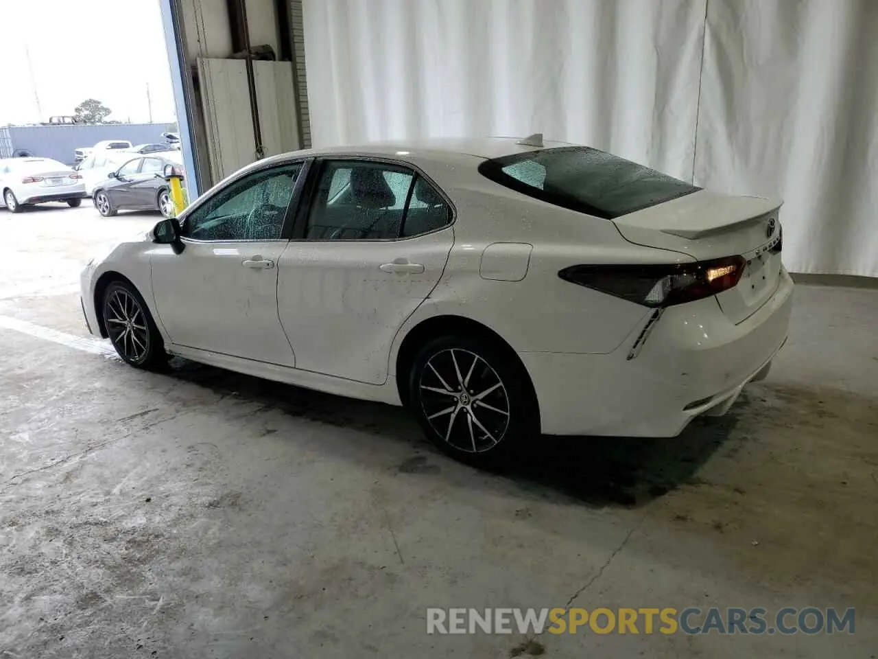 2 Photograph of a damaged car 4T1G11AK6MU586926 TOYOTA CAMRY 2021