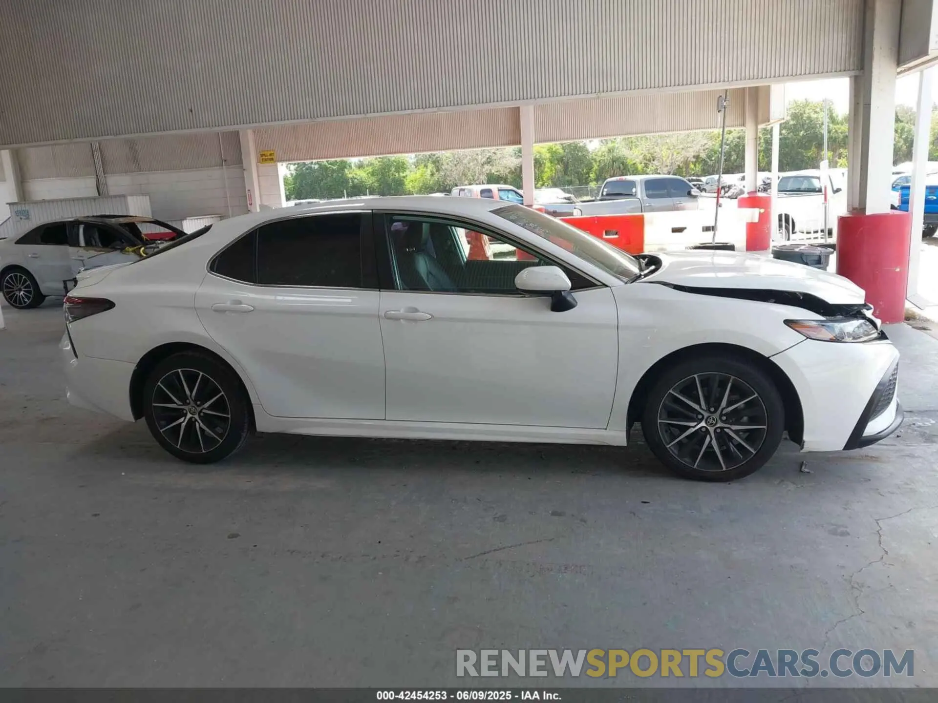 13 Photograph of a damaged car 4T1G11AK7MU580424 TOYOTA CAMRY 2021