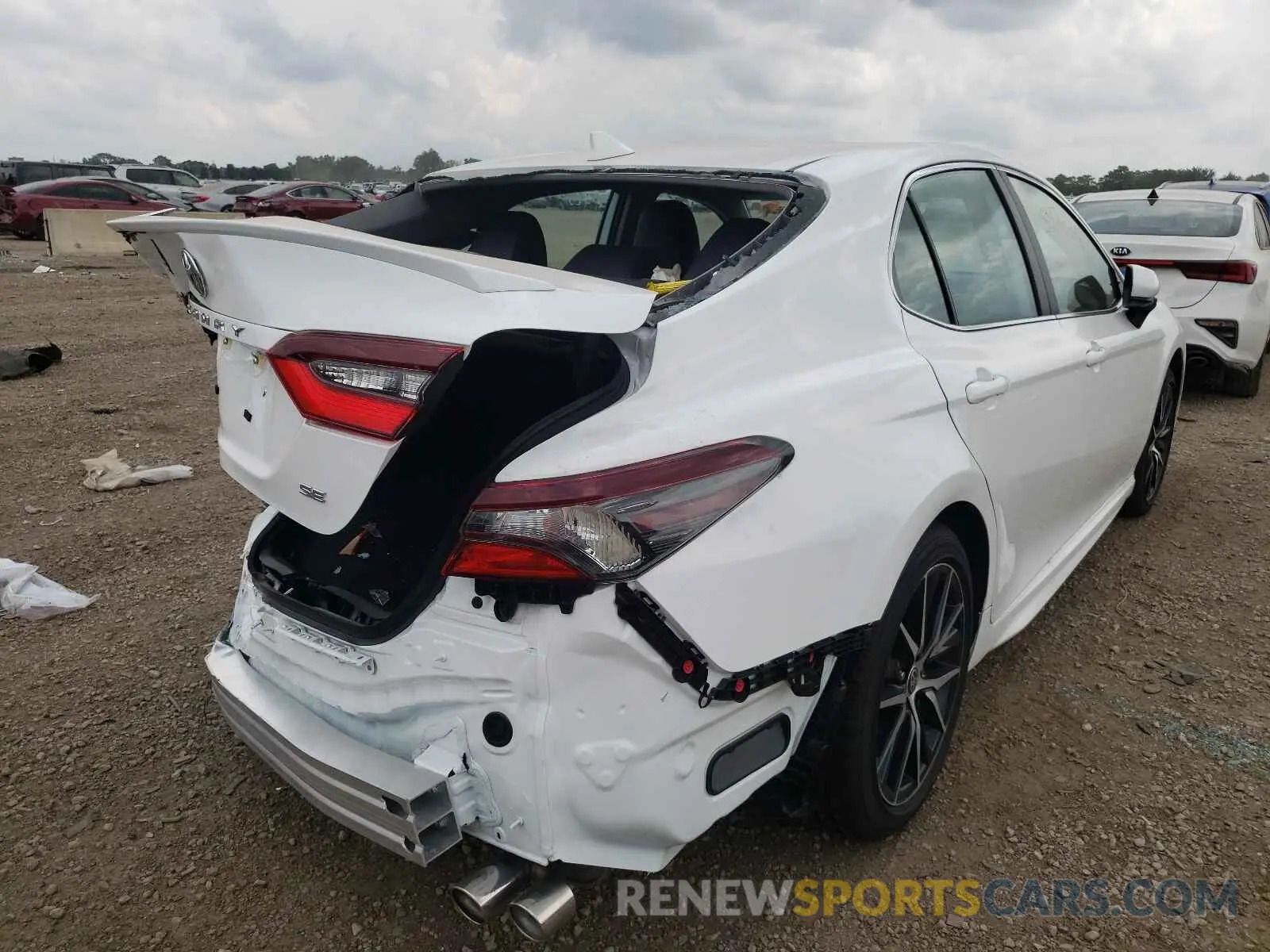 4 Photograph of a damaged car 4T1G11AKXMU593328 TOYOTA CAMRY 2021