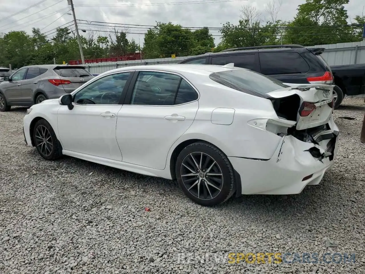 2 Photograph of a damaged car 4T1G11BK5MU030556 TOYOTA CAMRY 2021