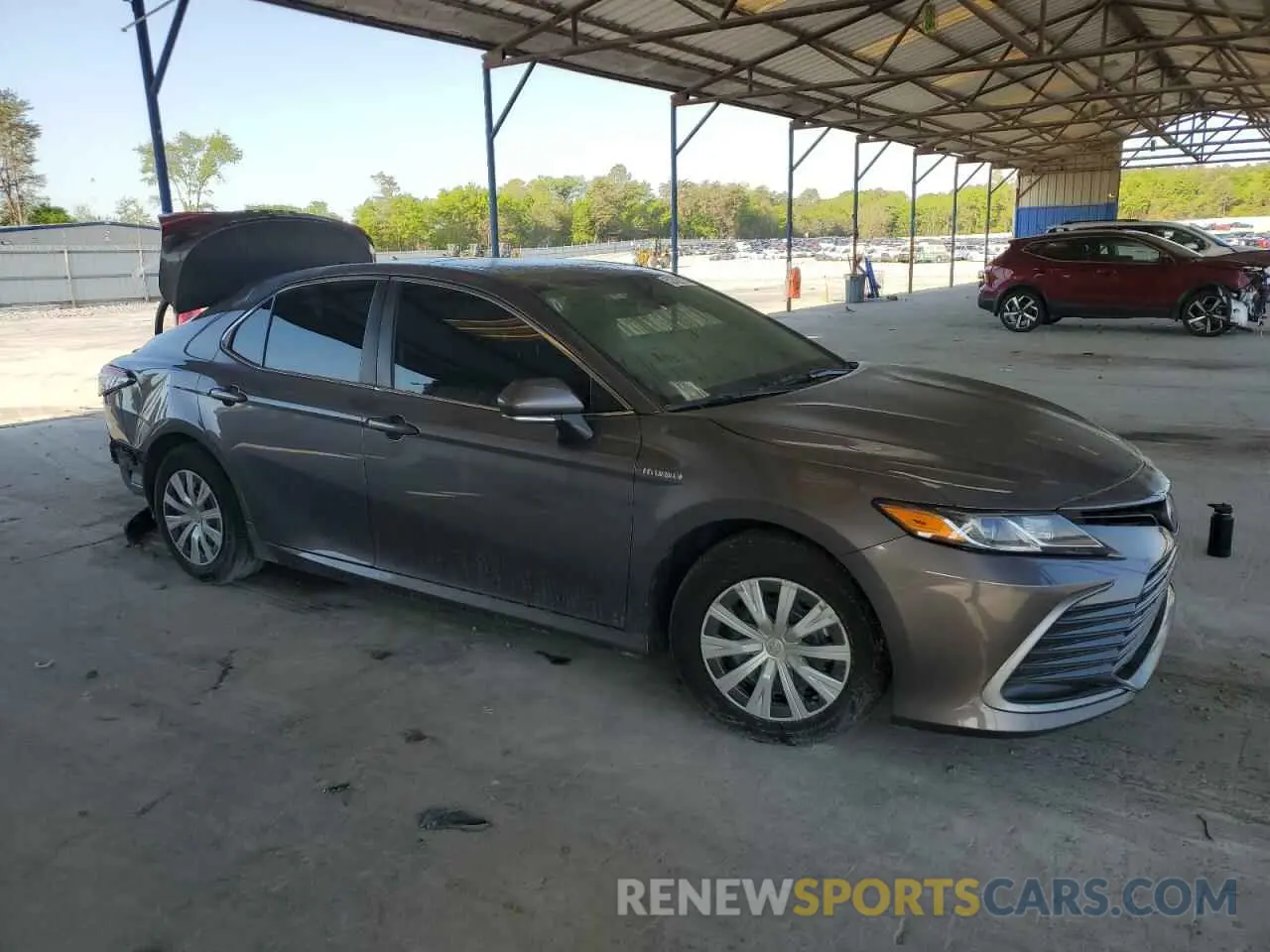 4 Photograph of a damaged car 4T1H31AK0MU559493 TOYOTA CAMRY 2021