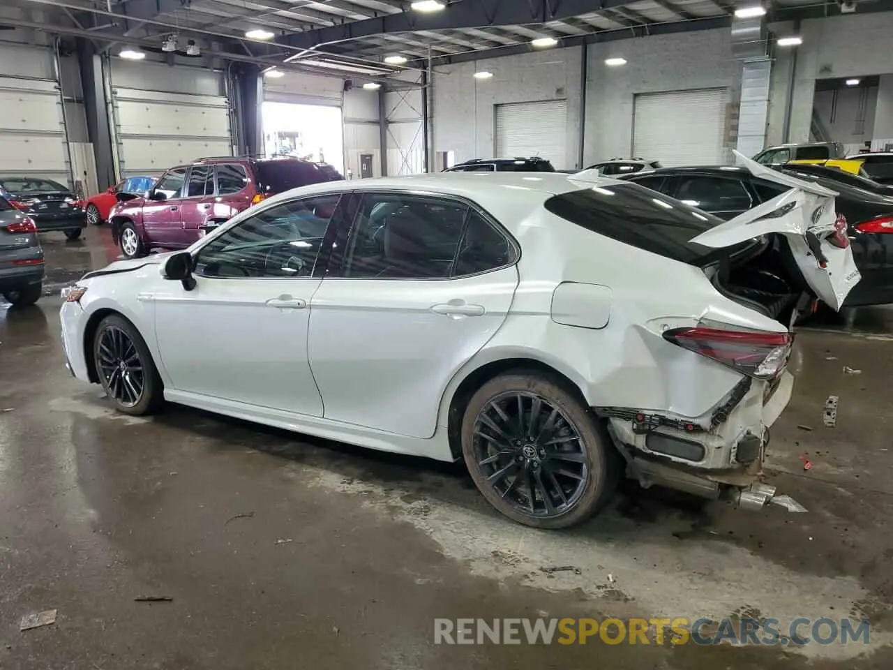 2 Photograph of a damaged car 4T1K31AK0MU030311 TOYOTA CAMRY 2021