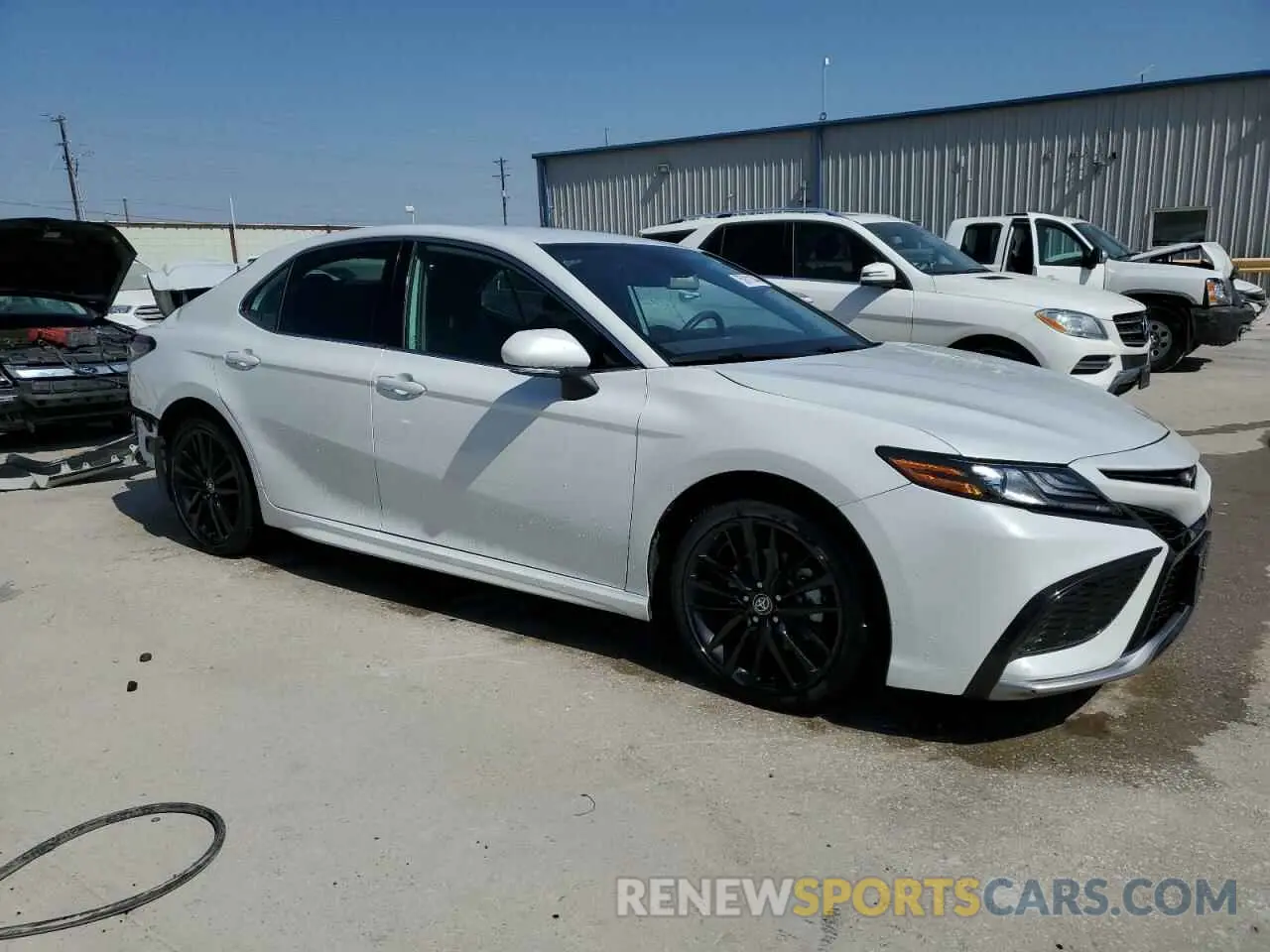 4 Photograph of a damaged car 4T1K61AK5MU587643 TOYOTA CAMRY 2021