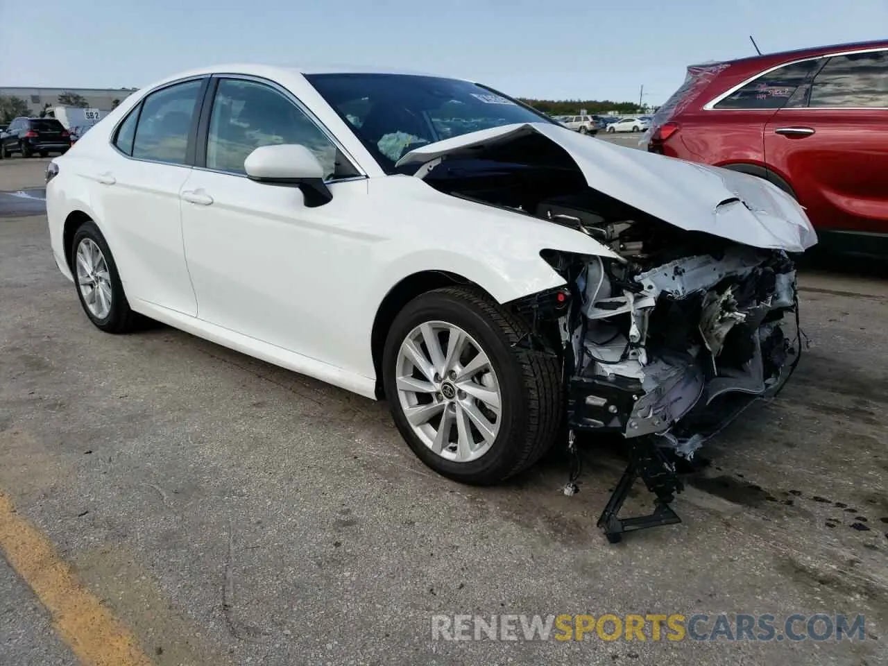 4 Фотография поврежденного автомобиля 4T1C11AK0NU674449 TOYOTA CAMRY 2022