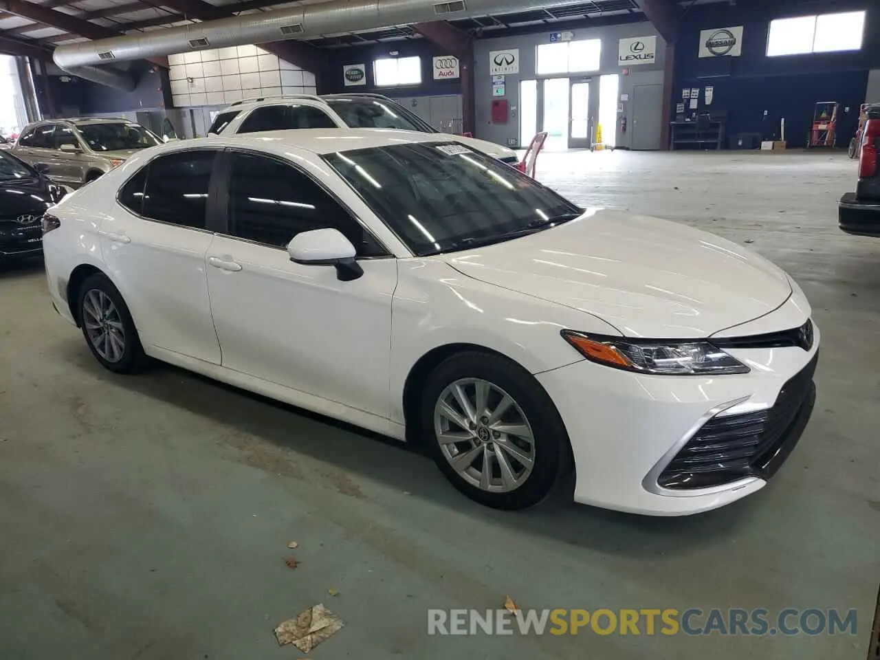4 Photograph of a damaged car 4T1C11AK2NU634860 TOYOTA CAMRY 2022