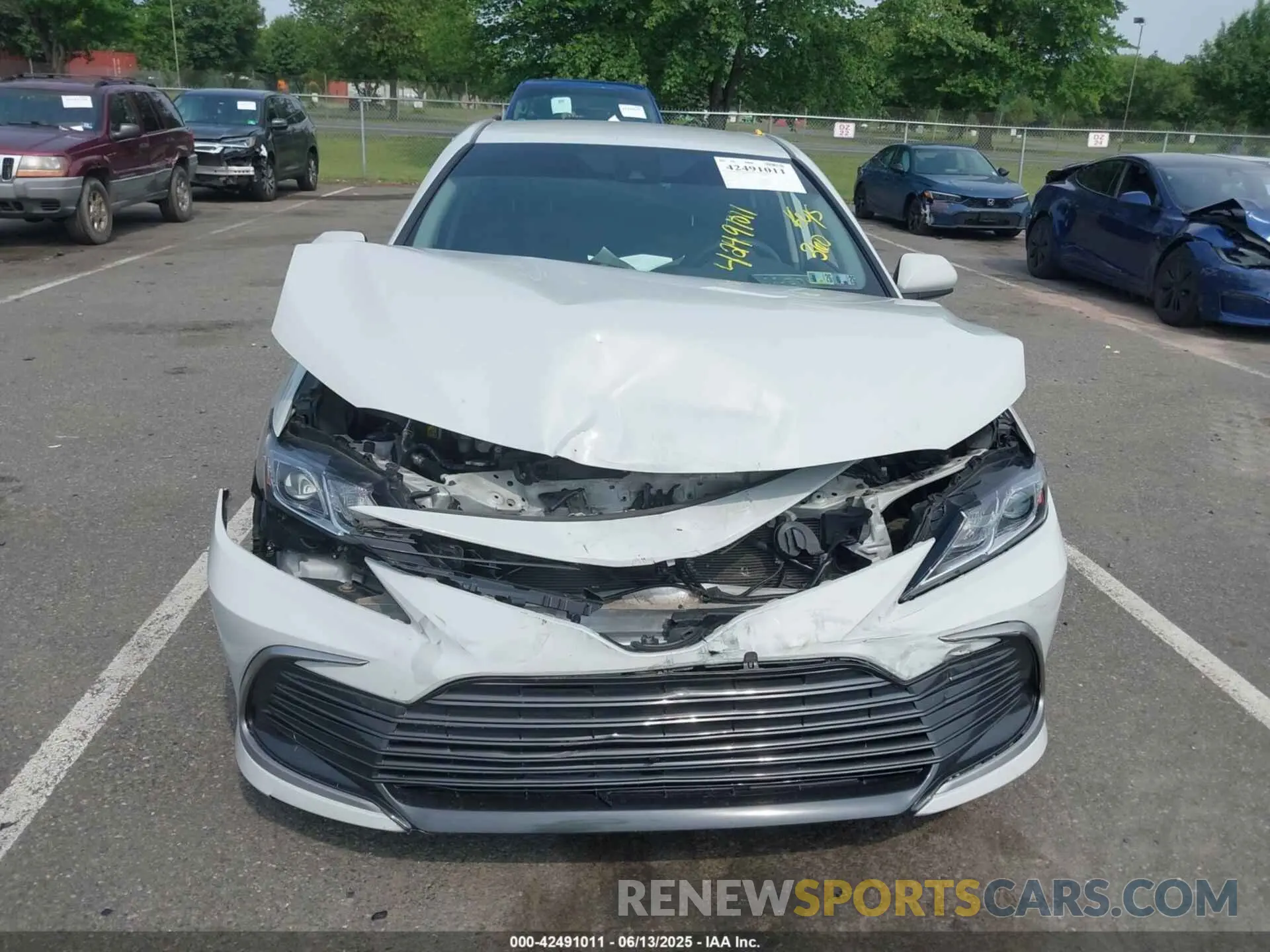 12 Photograph of a damaged car 4T1C11AKXNU018811 TOYOTA CAMRY 2022