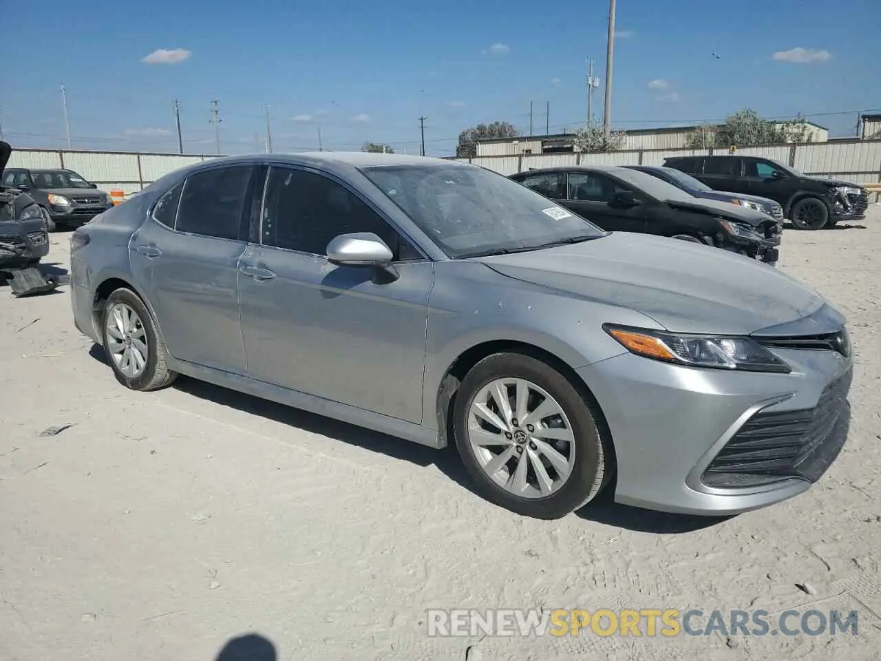 4 Photograph of a damaged car 4T1C11AKXNU652393 TOYOTA CAMRY 2022