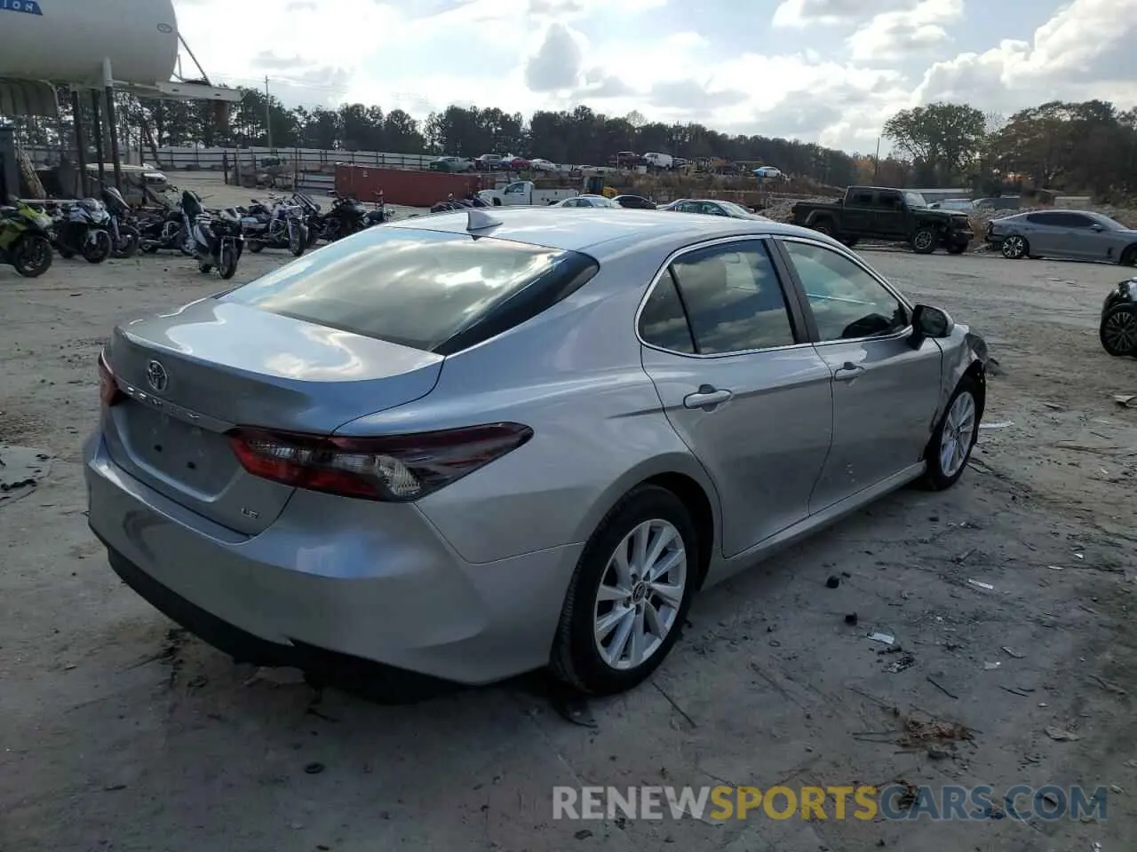 4 Фотография поврежденного автомобиля 4T1C11AKXNU668075 TOYOTA CAMRY 2022