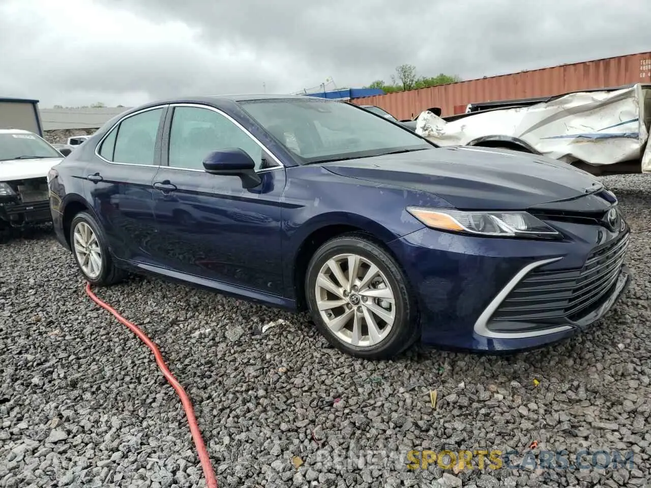 4 Photograph of a damaged car 4T1C11AKXNU680002 TOYOTA CAMRY 2022