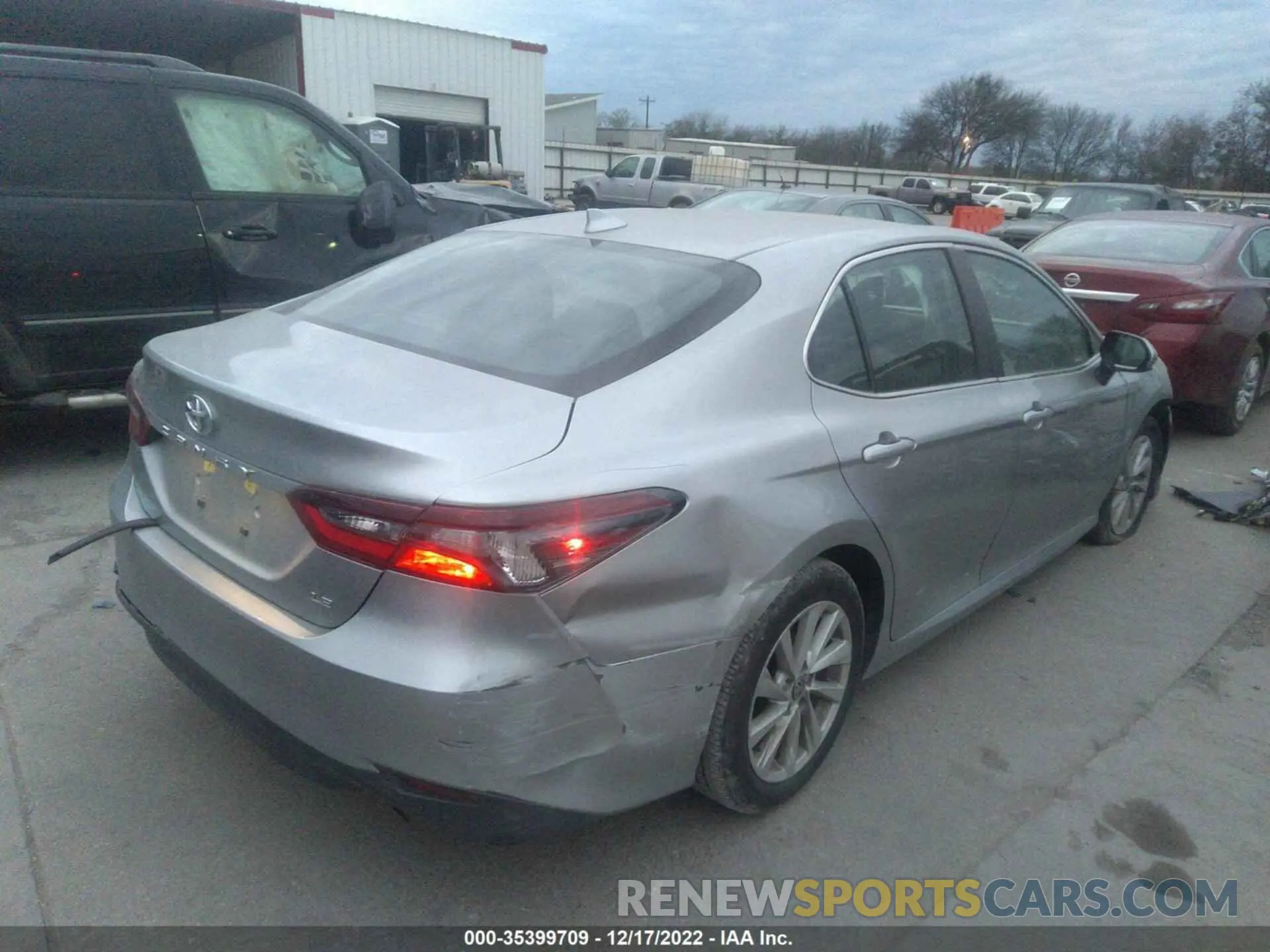 4 Photograph of a damaged car 4T1C11AKXNU698080 TOYOTA CAMRY 2022