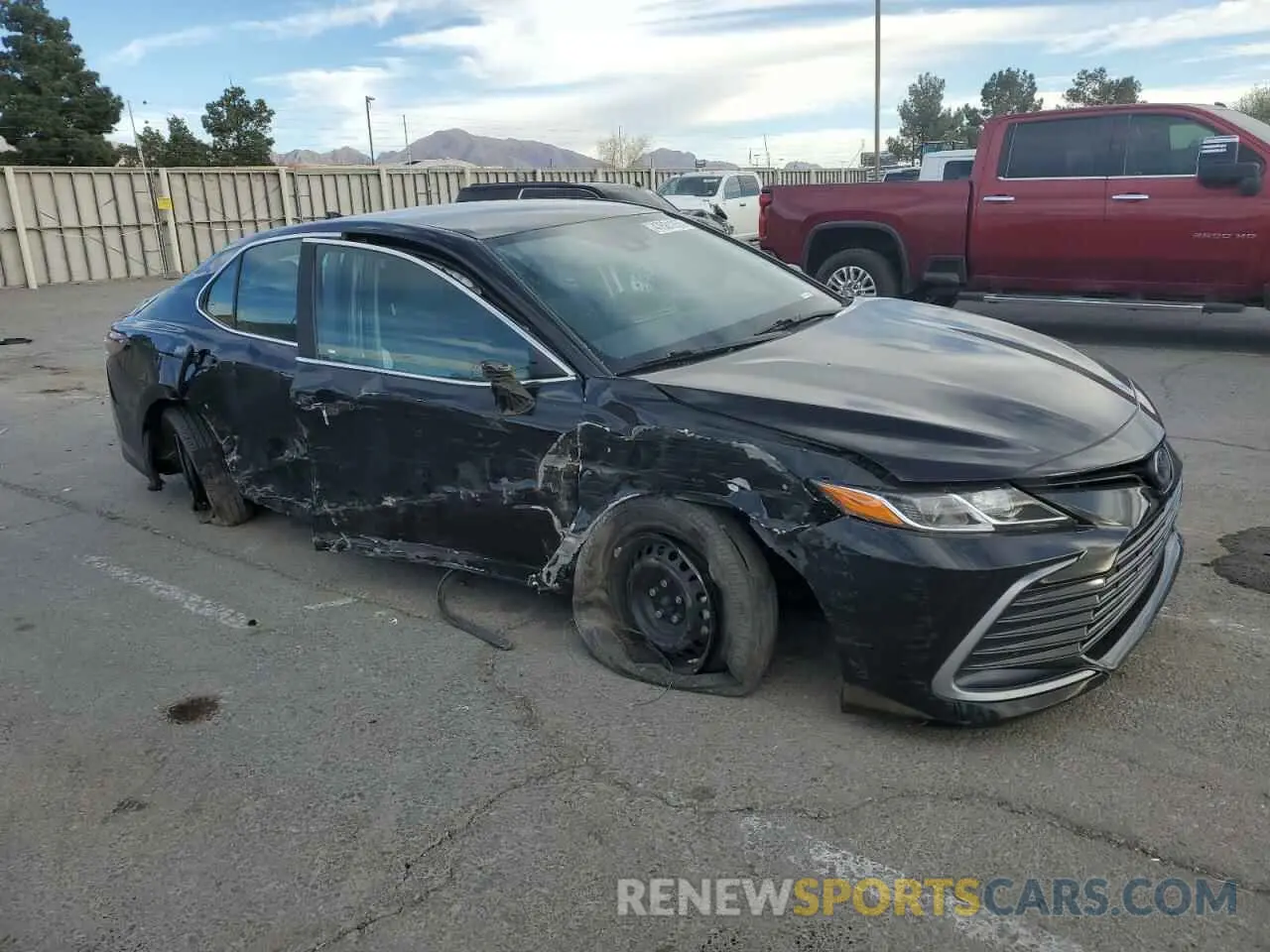 4 Фотография поврежденного автомобиля 4T1C31AKXNU587796 TOYOTA CAMRY 2022