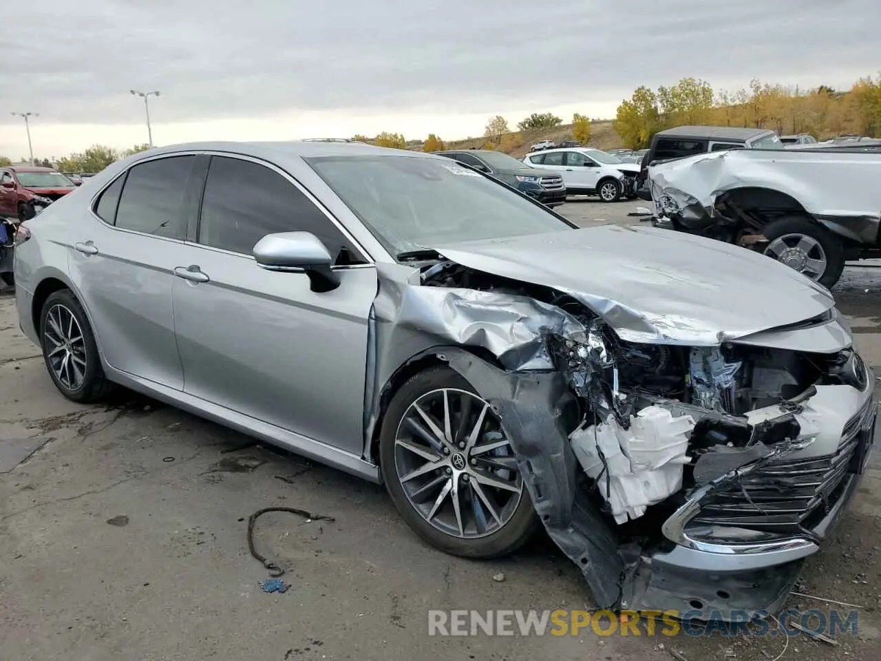 4 Photograph of a damaged car 4T1F11BK2NU056593 TOYOTA CAMRY 2022