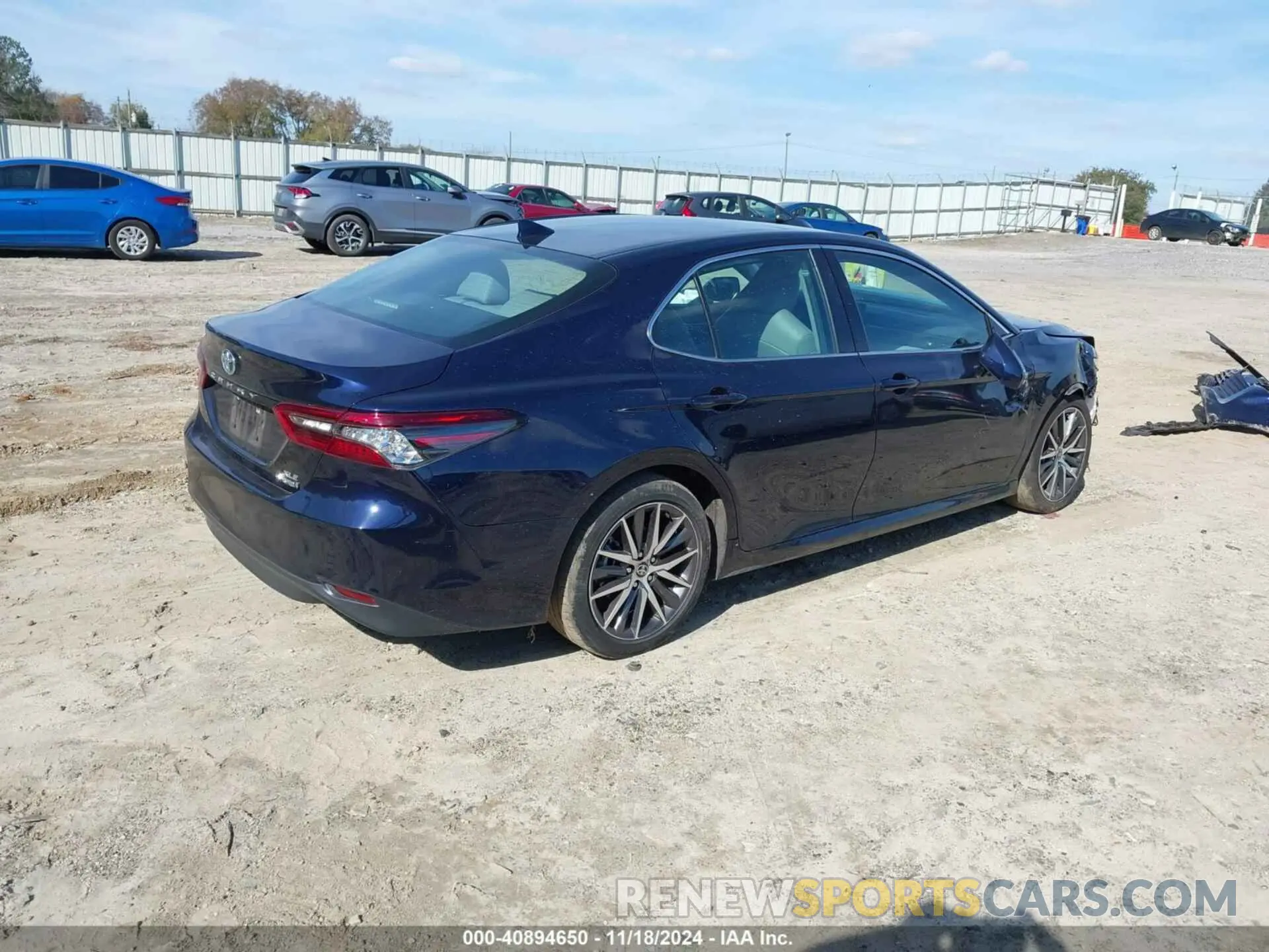 4 Photograph of a damaged car 4T1F31AK7NU584710 TOYOTA CAMRY 2022