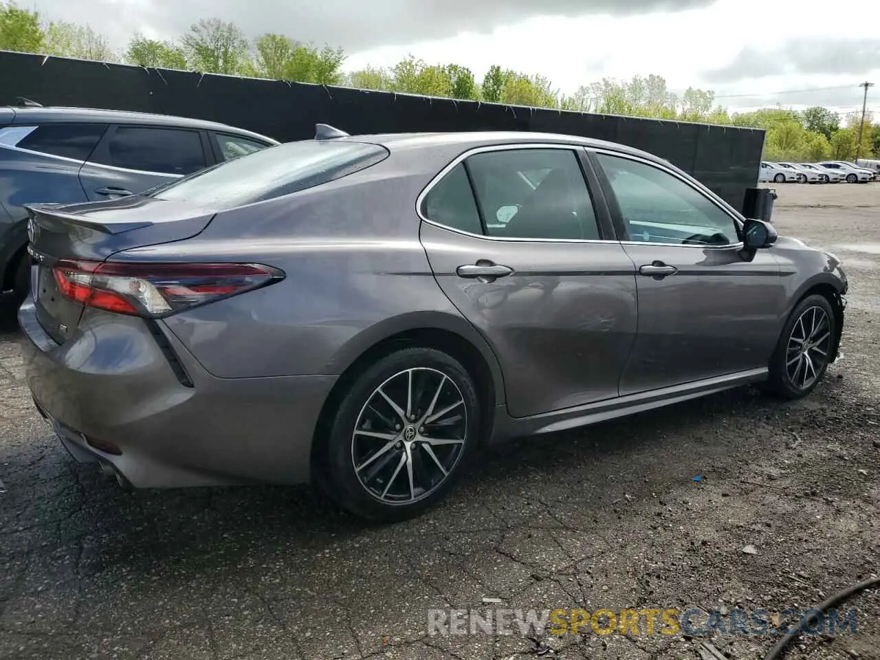 3 Photograph of a damaged car 4T1G11AK3NU628874 TOYOTA CAMRY 2022
