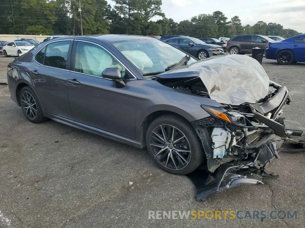 4 Photograph of a damaged car 4T1G11AK3NU631886 TOYOTA CAMRY 2022