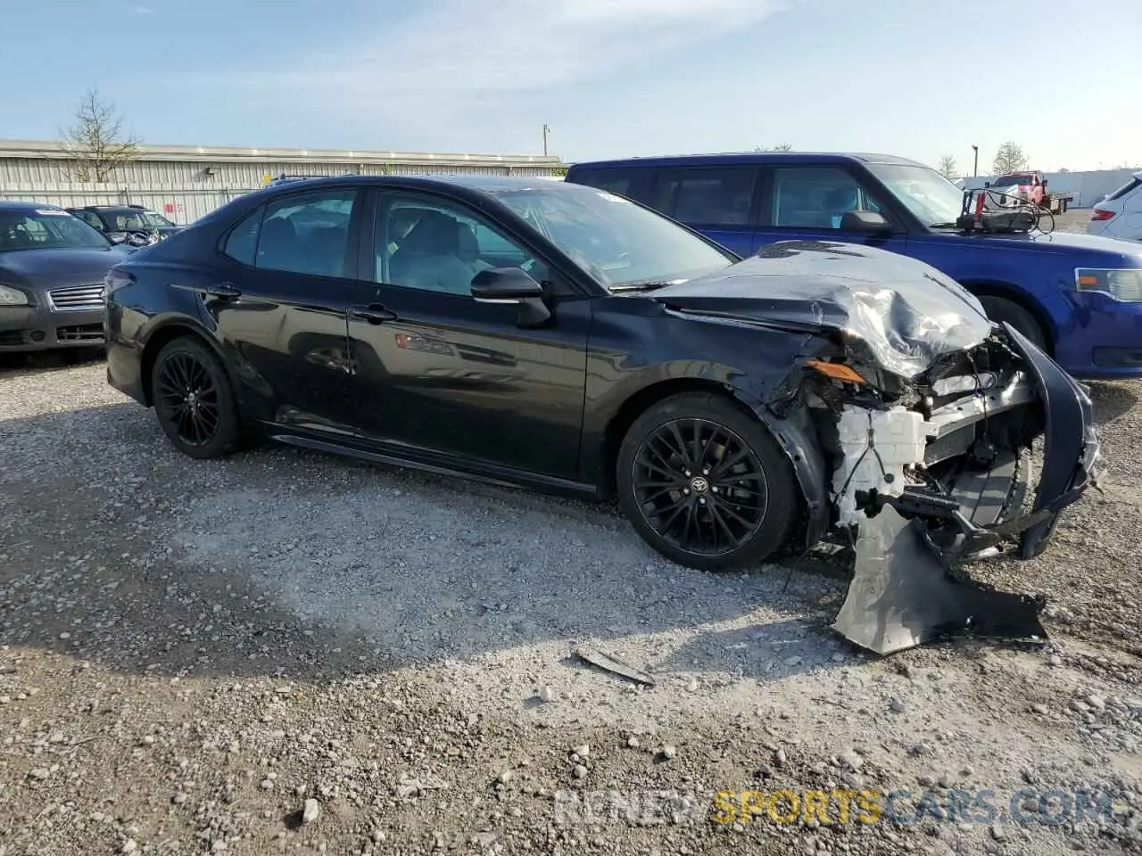 4 Photograph of a damaged car 4T1G11BK0NU048903 TOYOTA CAMRY 2022