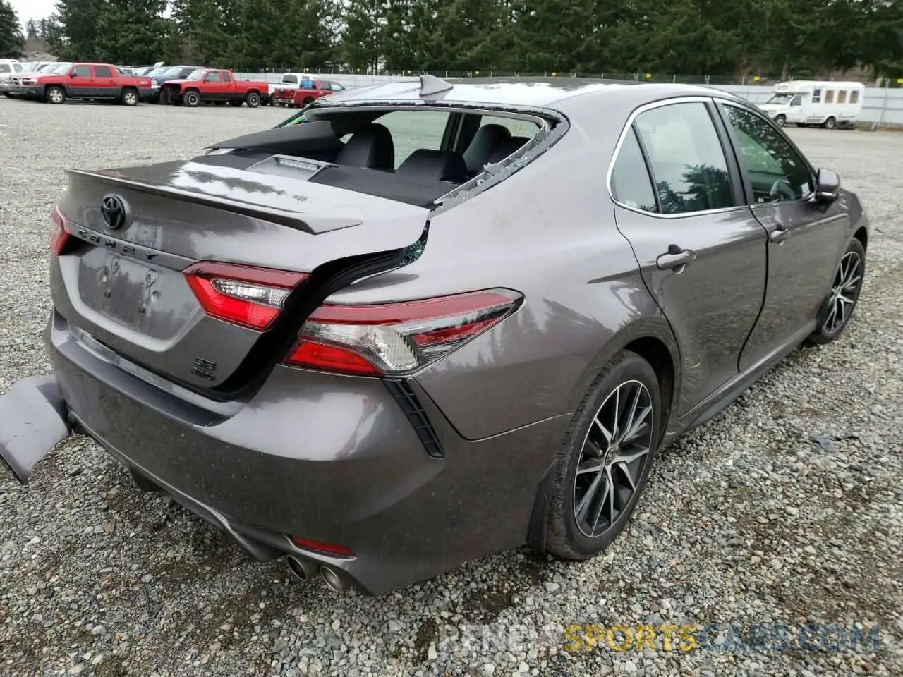4 Photograph of a damaged car 4T1G11BK4NU048502 TOYOTA CAMRY 2022