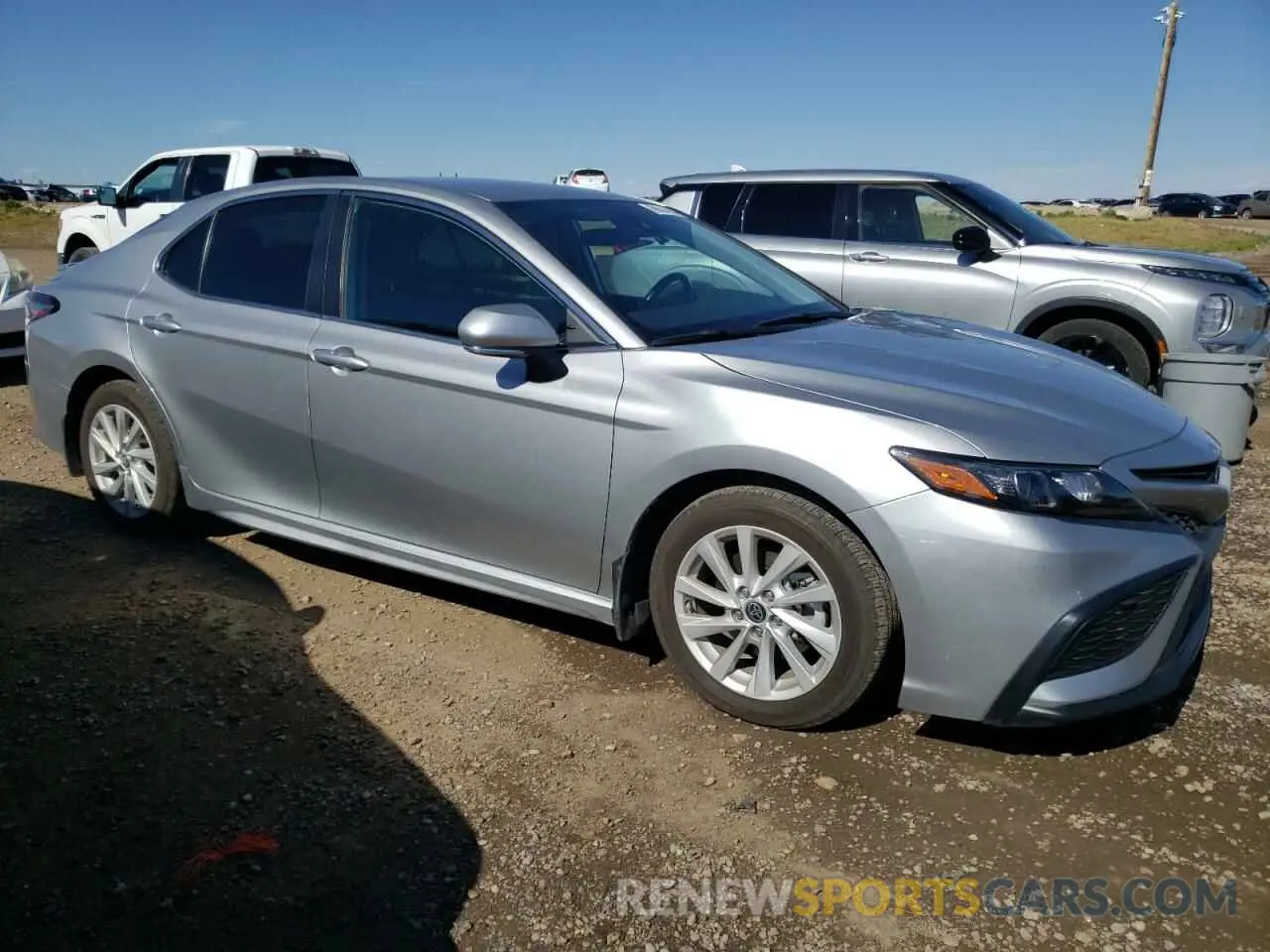 4 Фотография поврежденного автомобиля 4T1G11BKXNU057463 TOYOTA CAMRY 2022