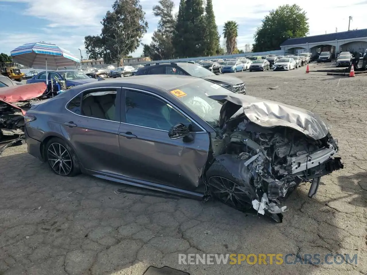 4 Photograph of a damaged car 4T1G31AK9NU597320 TOYOTA CAMRY 2022