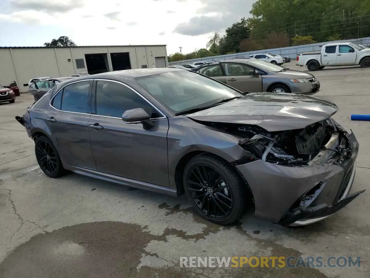 4 Photograph of a damaged car 4T1K31AK0NU596485 TOYOTA CAMRY 2022