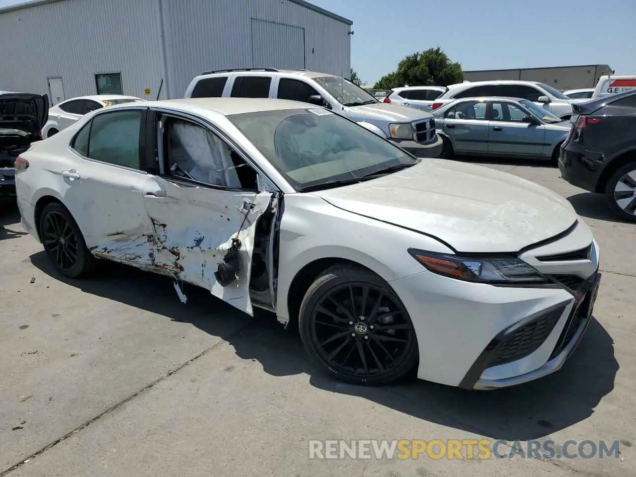 4 Photograph of a damaged car 4T1K31AK3NU571693 TOYOTA CAMRY 2022