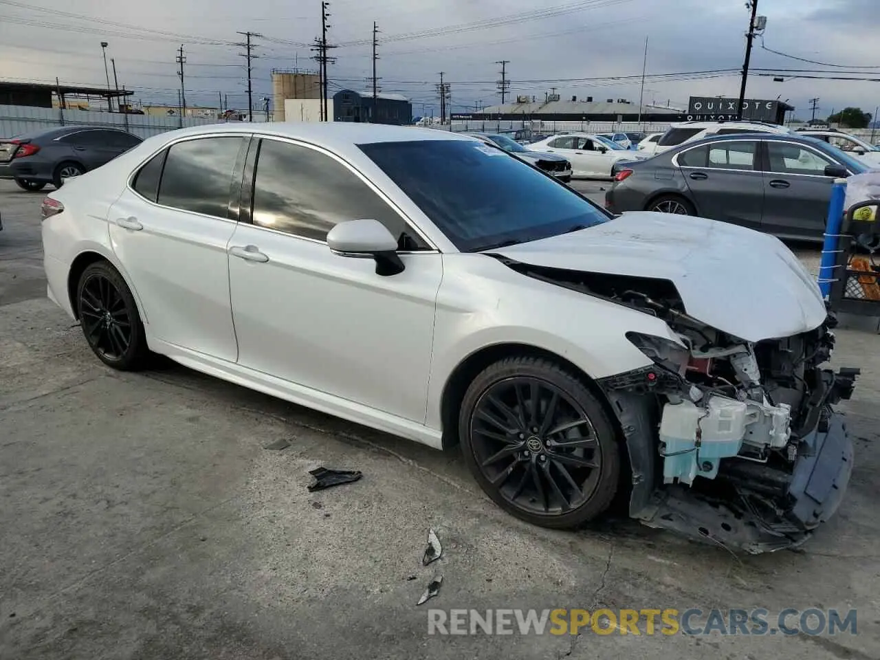 4 Photograph of a damaged car 4T1K31AK5NU576832 TOYOTA CAMRY 2022