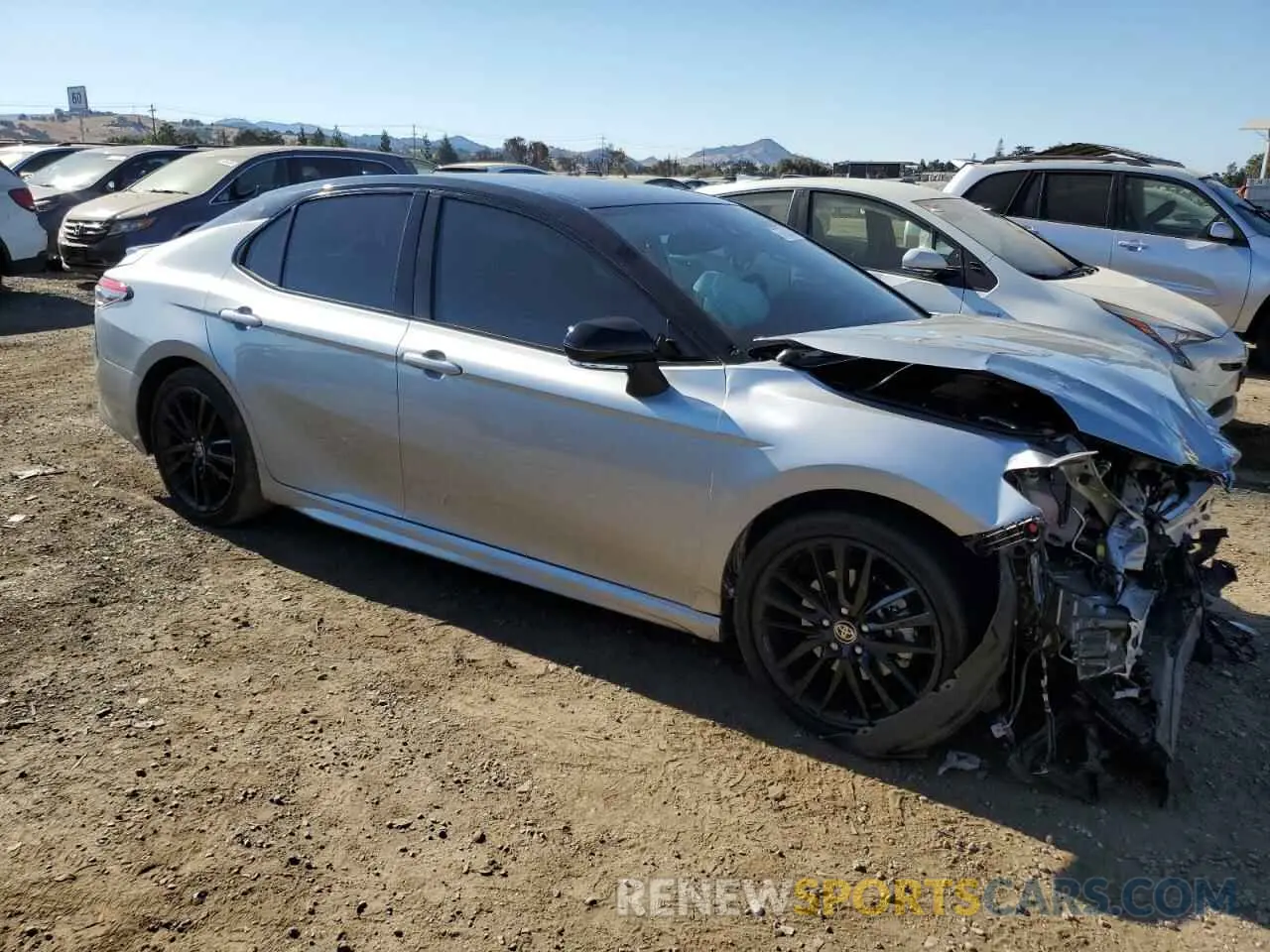 4 Photograph of a damaged car 4T1K31AK7NU034339 TOYOTA CAMRY 2022