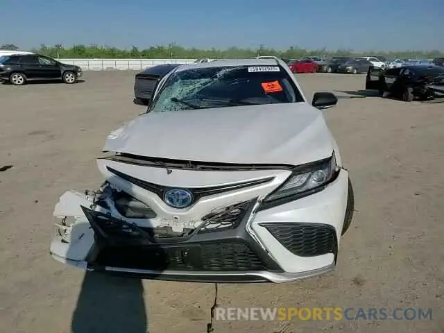 11 Photograph of a damaged car 4T1K31AK7NU594961 TOYOTA CAMRY 2022