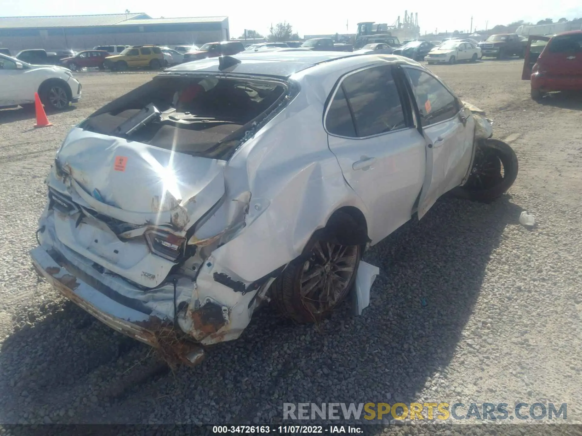 4 Photograph of a damaged car 4T1K61AK7NU033540 TOYOTA CAMRY 2022