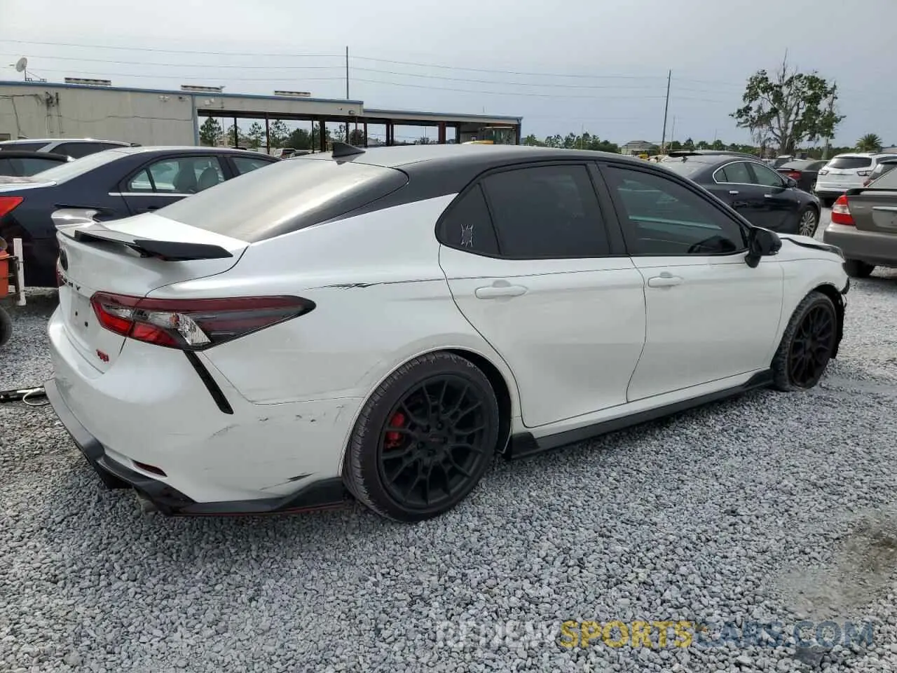 3 Фотография поврежденного автомобиля 4T1KZ1AK4NU064591 TOYOTA CAMRY 2022