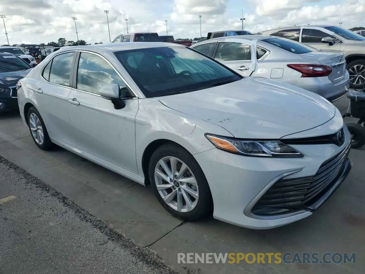 4 Photograph of a damaged car 4T1R11AK1NU015838 TOYOTA CAMRY 2022