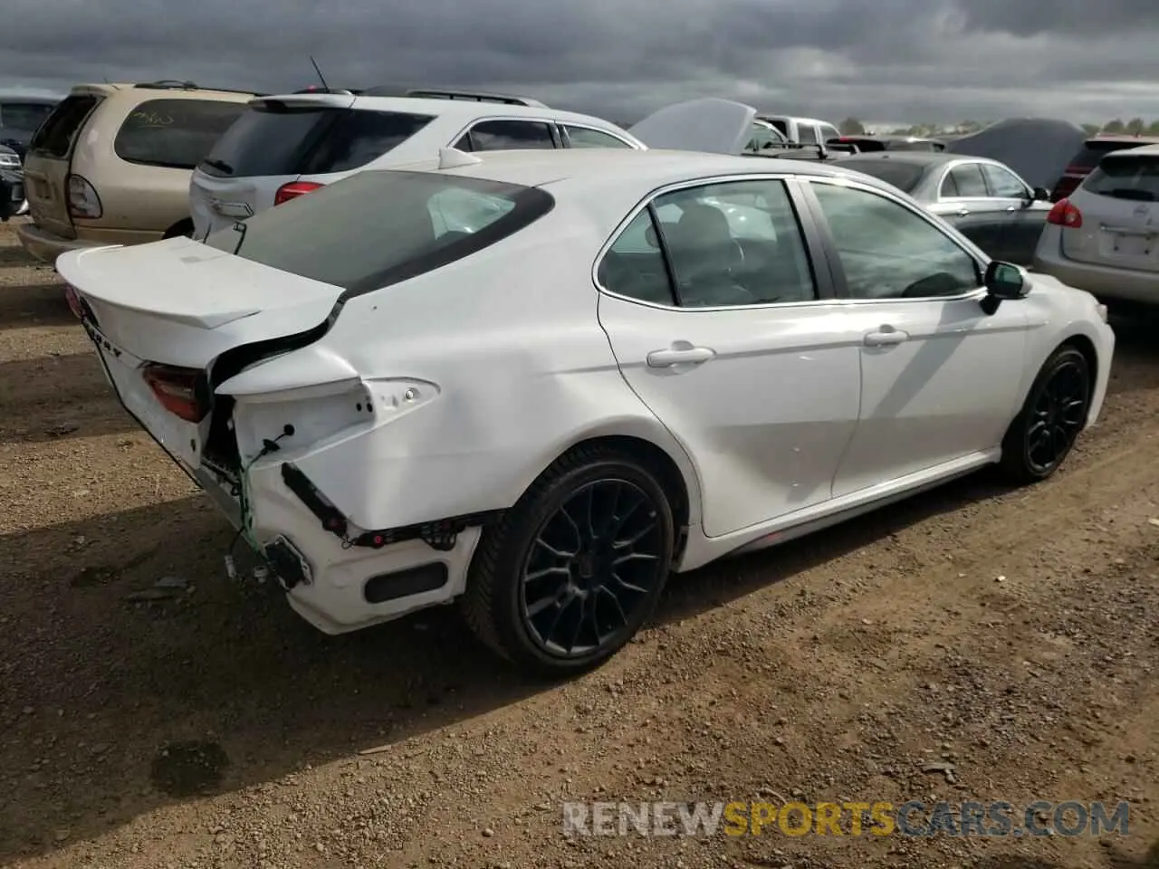 3 Photograph of a damaged car 4T1T11AK9NU653843 TOYOTA CAMRY 2022