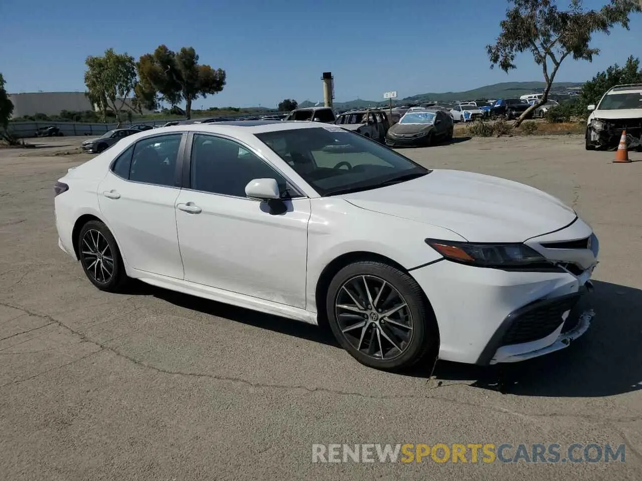 4 Photograph of a damaged car 4T1T11AKXNU624951 TOYOTA CAMRY 2022