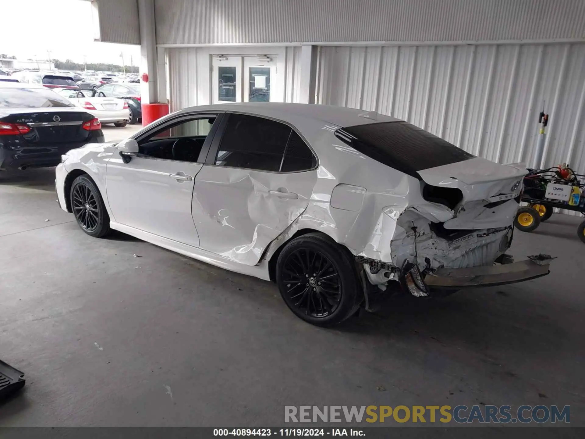 3 Photograph of a damaged car 4T1T11AKXNU642754 TOYOTA CAMRY 2022