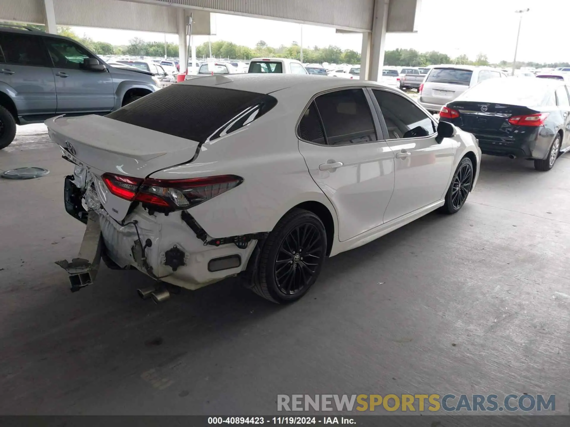 4 Photograph of a damaged car 4T1T11AKXNU642754 TOYOTA CAMRY 2022
