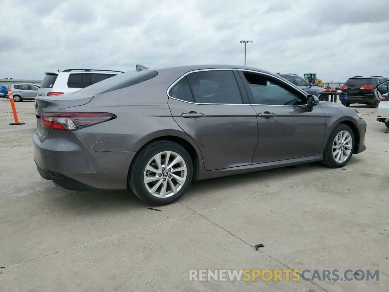 3 Photograph of a damaged car 4T1C11AK1PU776569 TOYOTA CAMRY 2023