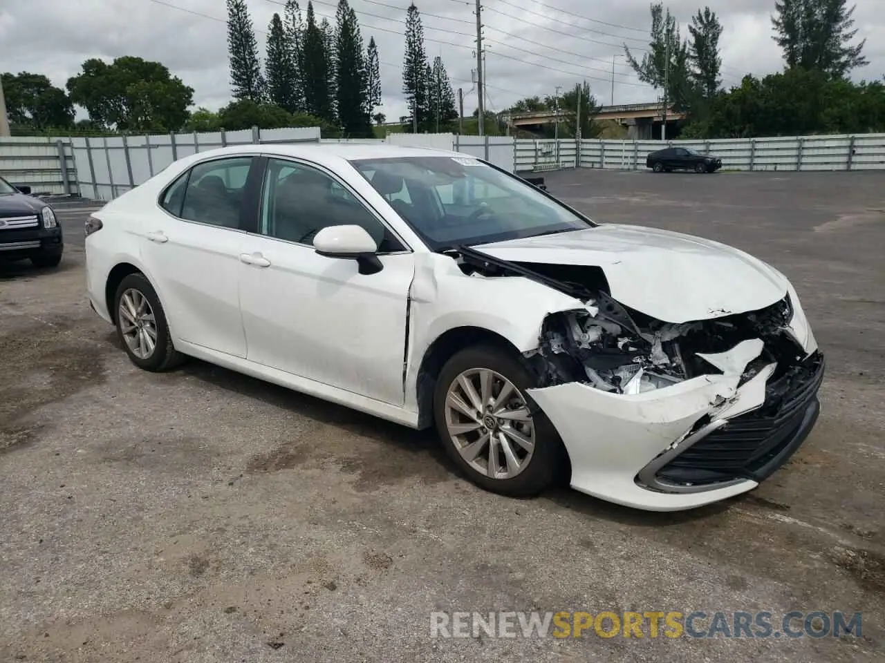 4 Photograph of a damaged car 4T1C11AK3PU810754 TOYOTA CAMRY 2023