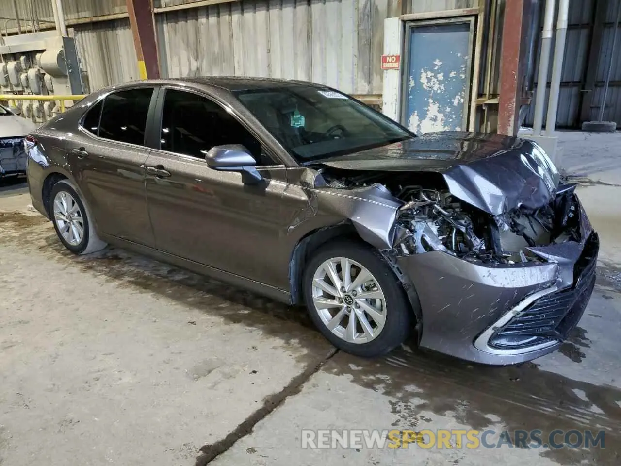 4 Photograph of a damaged car 4T1C11AK5PU775408 TOYOTA CAMRY 2023