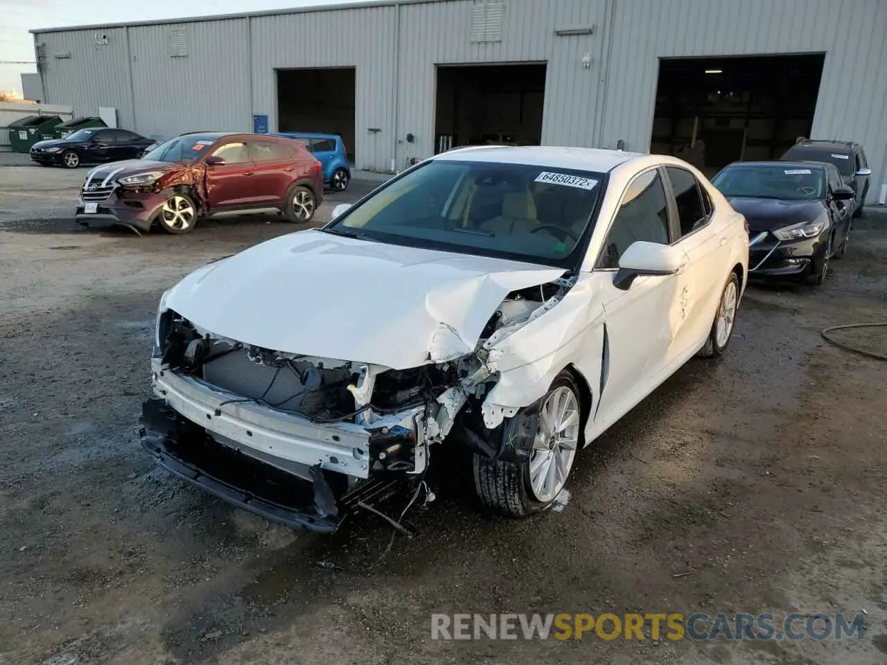2 Photograph of a damaged car 4T1C11AK9PU086939 TOYOTA CAMRY 2023