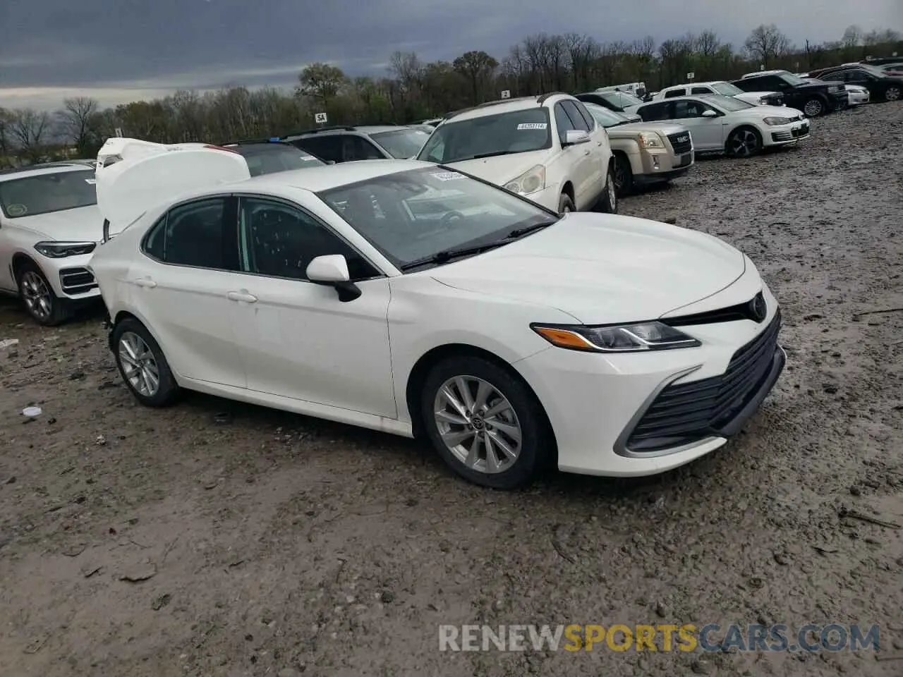 4 Photograph of a damaged car 4T1C11AK9PU106896 TOYOTA CAMRY 2023