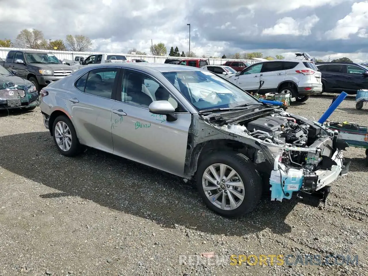4 Photograph of a damaged car 4T1C11AK9PU813030 TOYOTA CAMRY 2023