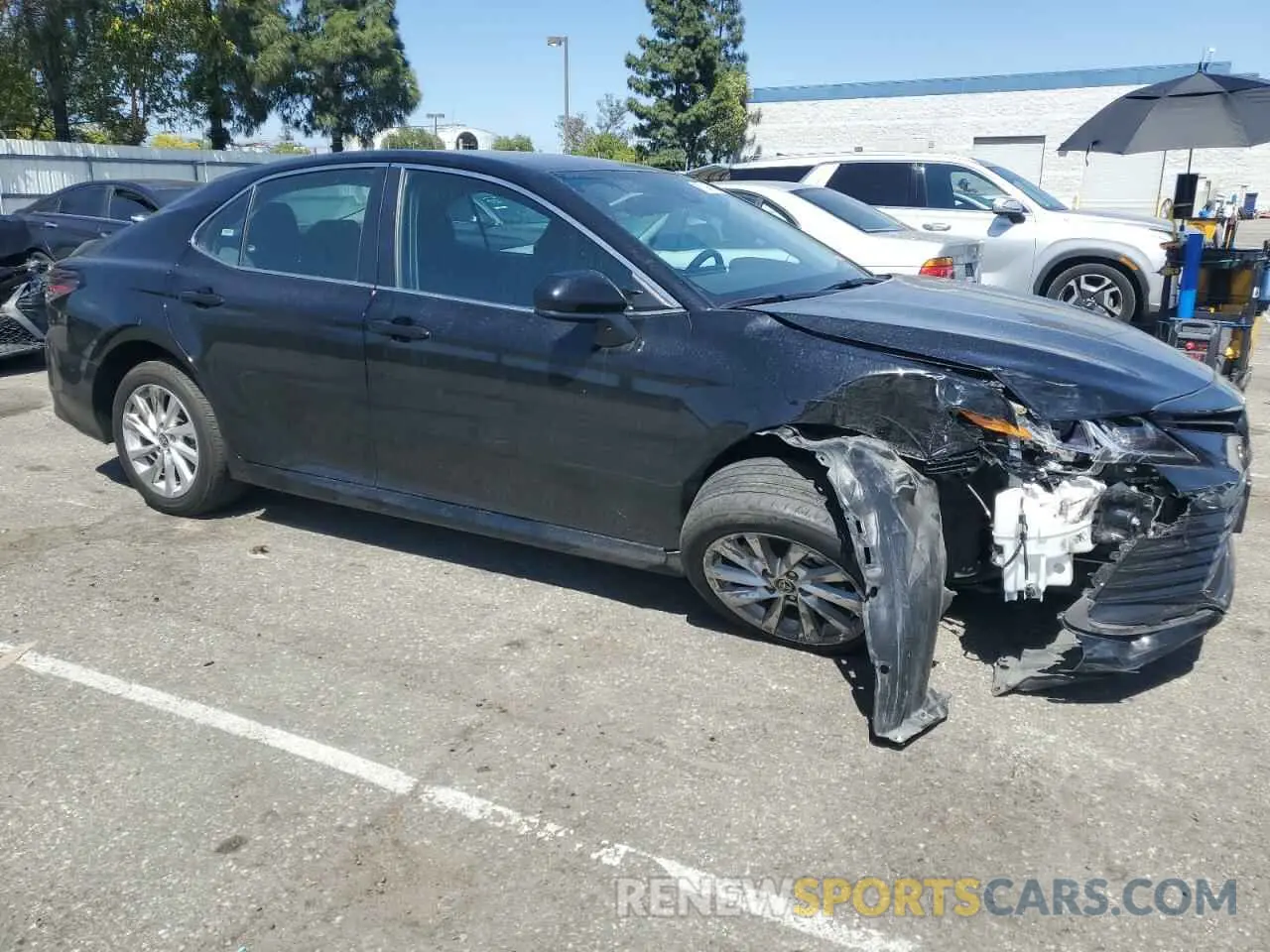 4 Photograph of a damaged car 4T1C11AK9PU839661 TOYOTA CAMRY 2023