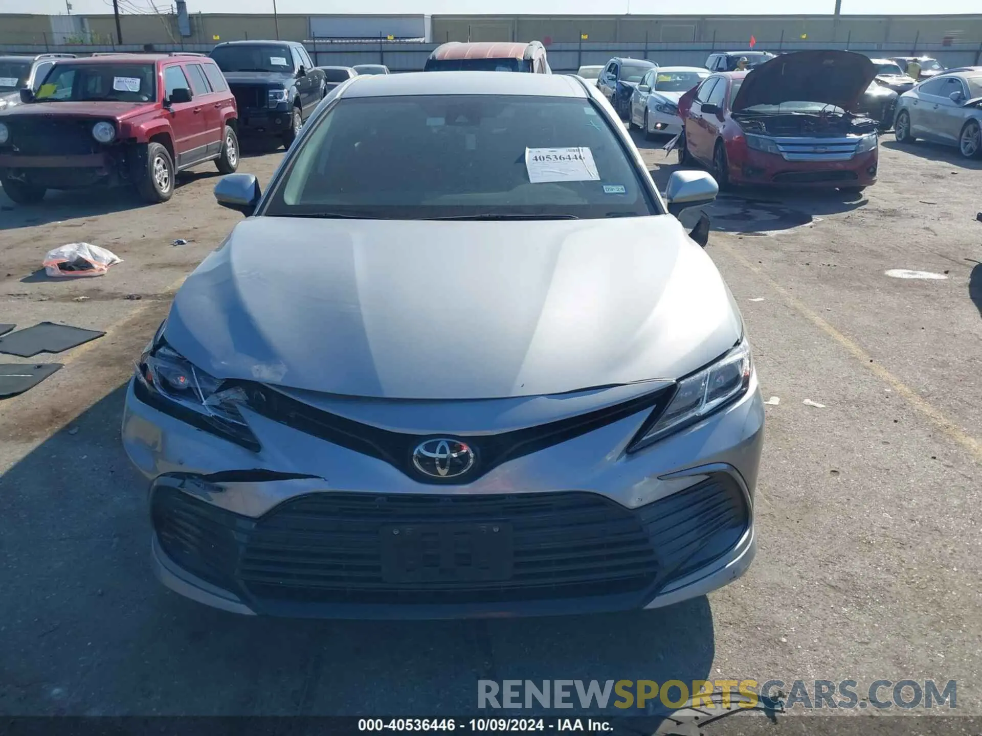 12 Photograph of a damaged car 4T1C11AKXPU097058 TOYOTA CAMRY 2023